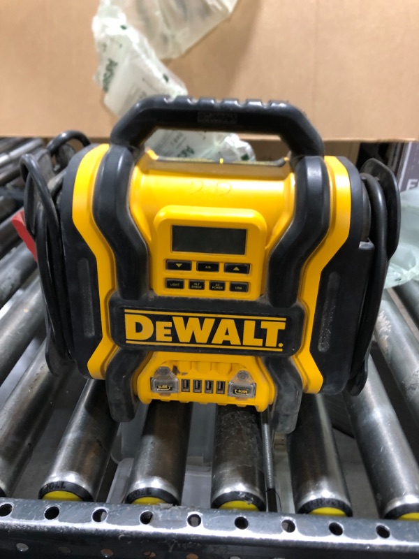 Photo 2 of DEWALT DXAEPS14 1600 Peak Battery Amp 12V Automotive Jump Starter/Power Station with 500 Watt AC Power Inverter, 120 PSI Digital Compressor, and USB Power , Yellow