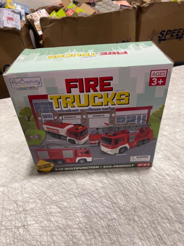 Photo 2 of ArtCreativity Light Up Fire Trucks for Kids, Set of 3, Includes Ladder Truck, Tanker Truck, & Engine Truck, Fire Trucks with Real Water Spraying, LEDs, & Sound, Push n Go Fire Trucks for Boys & Girls
