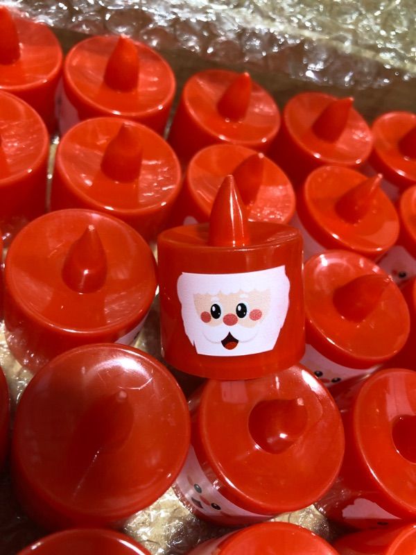 Photo 1 of  48 Pcs Christmas Led Tea Lights Bulk Flameless Candles with Christmas Snowman Face Battery Operated Flickering Candles Led Cute Candles for Christmas Wedding Home Party Decor, 4 Designs