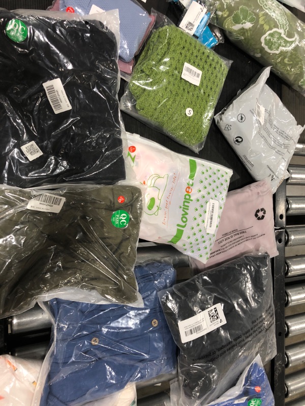 Photo 1 of  Miscallnoues buy as is -- clothes are in different size  