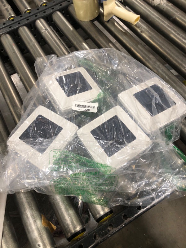 Photo 1 of 4 pack solar lights