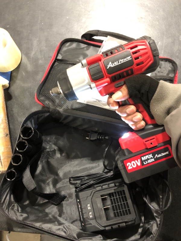 Photo 2 of AVID POWER Cordless Impact Wrench, 1/2 Impact Gun w/Max Torque 330 ft lbs (450N.m), Power w/ 3.0A Li-ion Battery, 4 Pcs Impact Sockets and 1 Hour Fast Charger
 Avid Power Cordless Impact drill