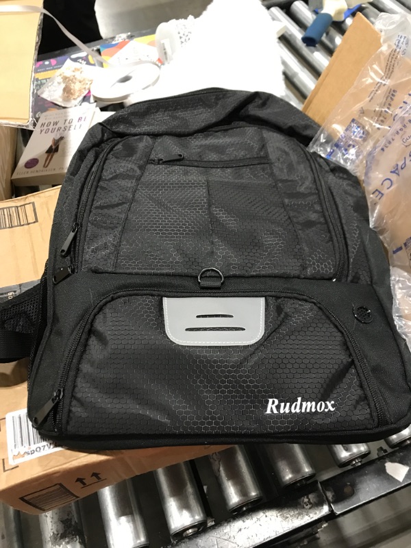 Photo 1 of black back pack 