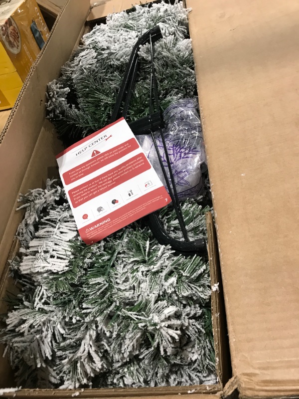 Photo 1 of Abbrevi 6 Ft Prelit Flocked Christmas Tree Artificial Christmas Trees with 260 Warm White LED Lights and 750 Branches, Pre lit Xmas Tree for Indoor Outdoor Yard Decorations