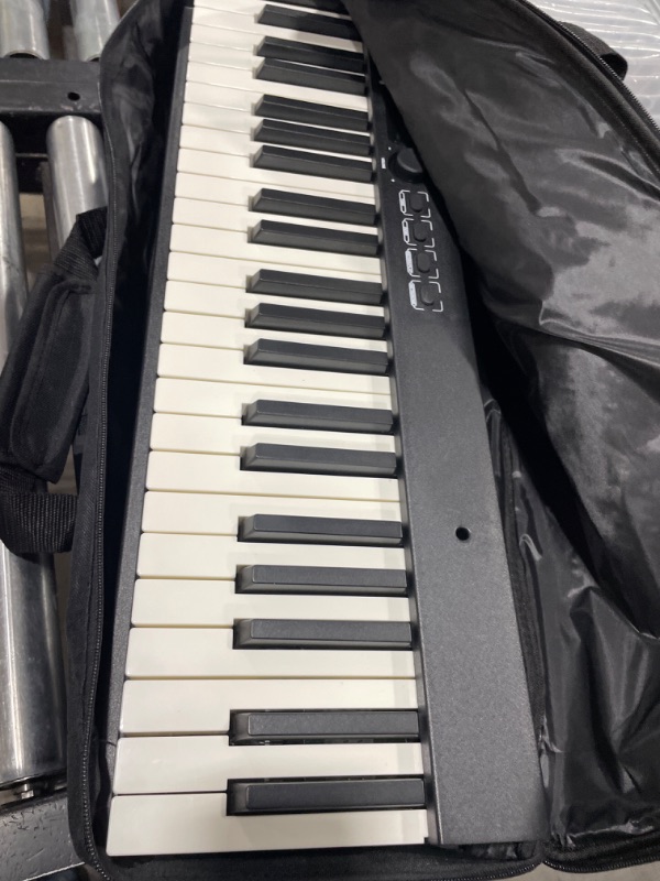 Photo 4 of Eastar EP-10 Beginner Foldable Digital Piano 88 Key Full Size Semi Weighted Keyboard, Bluetooth Portable Electric Piano with Piano Bag