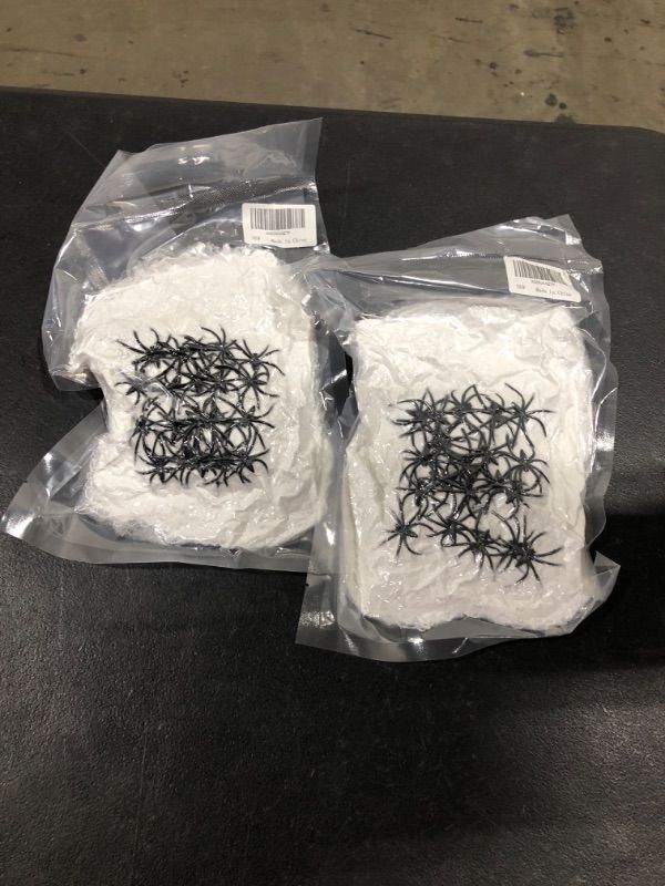 Photo 1 of 2 PACK- OPULARS Spider Web 300 Sqft Halloween Spider Web Decoration,Super Stretchy Cobwebs Spider Webs with 20 Fake Spiders,Halloween Decorations Indoor,Outdoor, Courtyard, Lawn,Porch, Haunted House 300 Square Feet White
