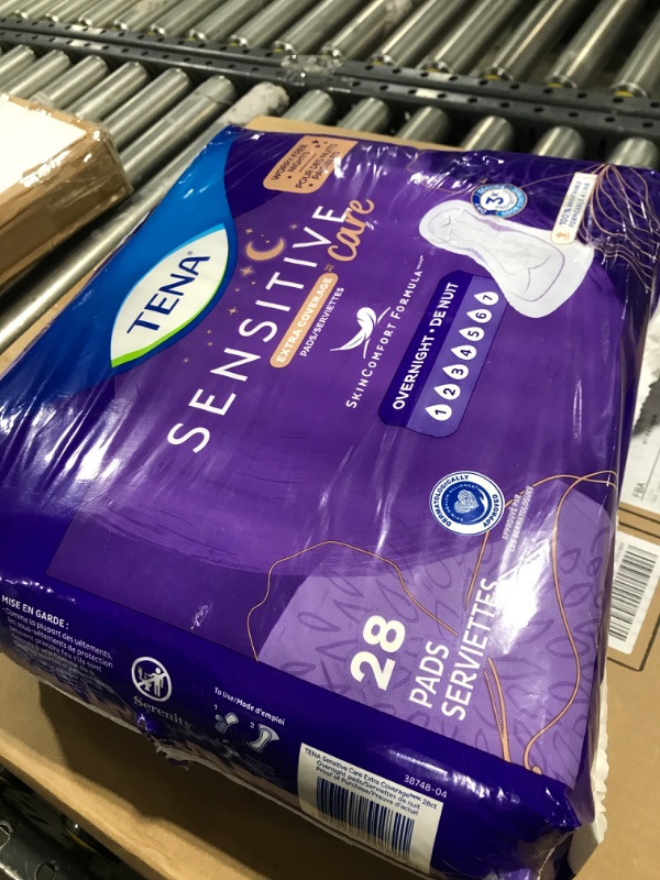 Photo 1 of TENA Intimates Overnight Dry-Fast Core Adult Female Bladder Control Pads, 16 Inch, 28 Count, 1 Pack 28 Count (Pack of 1)