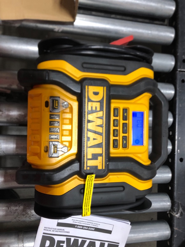 Photo 2 of DEWALT DXAEPS14 1600 Peak Battery Amp 12V Automotive Jump Starter/Power Station with 500 Watt AC Power Inverter, 120 PSI Digital Compressor, and USB Power , Yellow