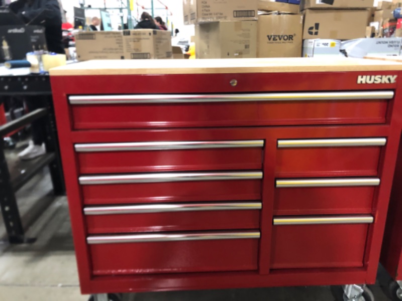 Photo 1 of **SOME RUST** 42 in. W x 18.1 in. D 8-Drawer Red Mobile Workbench Cabinet with Solid Wood Top
