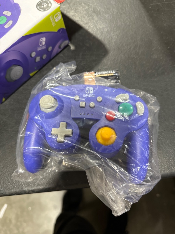 Photo 2 of PowerA Wireless GameCube Style Controller for Nintendo Switch - Purple & Mario + Rabbids Sparks of Hope – Standard Edition Wireless Purple Controller + Mario + Rabbids Sparks