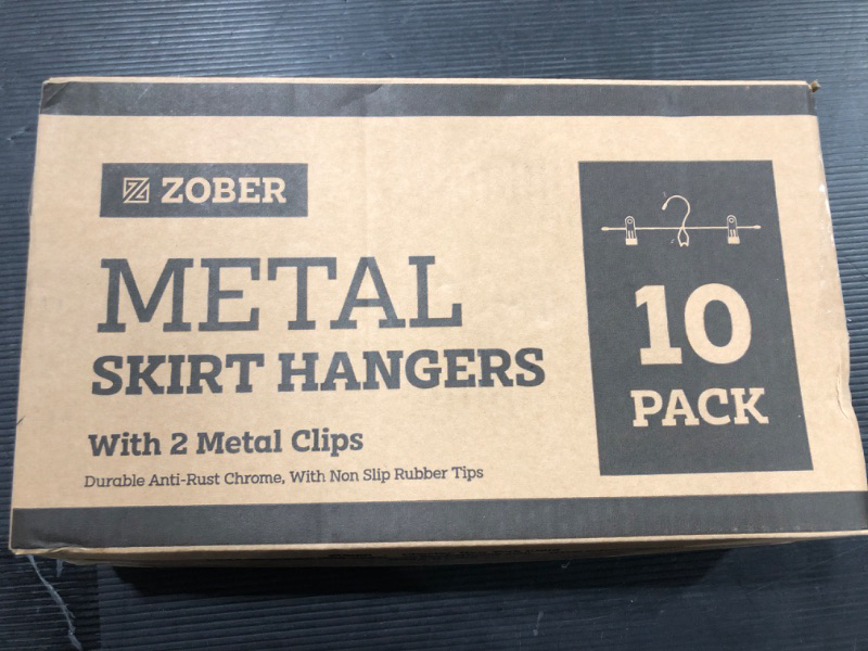 Photo 1 of ZOBER 10 PACK METAL SKIRT HANGERS
CHROME WITH BLACK TIPS
WITH 2 METAL CLIPS