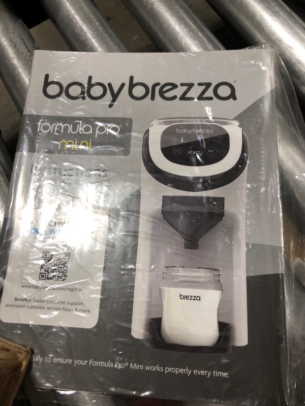Photo 3 of Baby Brezza Formula Pro Mini Baby Formula Maker – Small Baby Formula Mixer Machine Fits Small Spaces and is Portable for Travel– Bottle Makers Makes The Perfect Bottle for Your Infant On The Go Formula Pro Mini Dispenser Machine