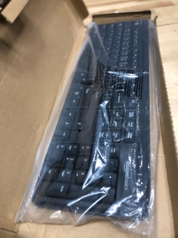 Photo 2 of Amazon Basics Wireless Computer Keyboard and Mouse Combo - Quiet and Compact - US Layout (QWERTY)