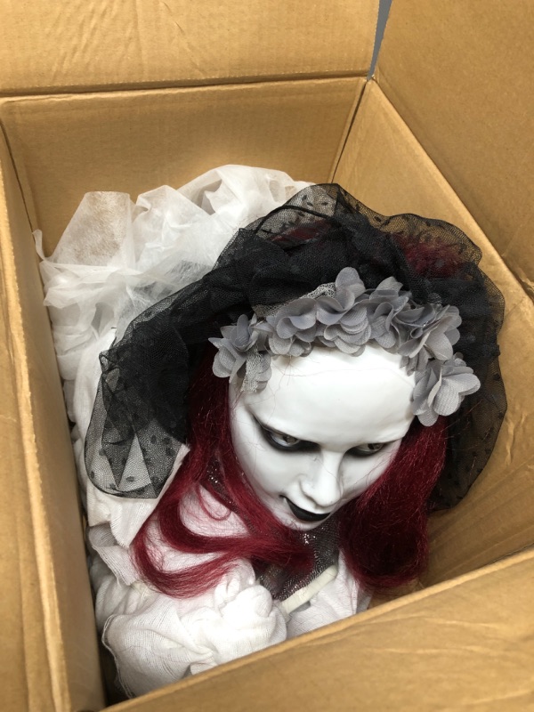 Photo 2 of Haunted Hill Farm Animatronic Scary Haunted Crawling Bride with Touch Activated Lights and Sound, Battery-Operated Indoor or Covered Outdoor Halloween Decoration 63" Animated Crawling Bride