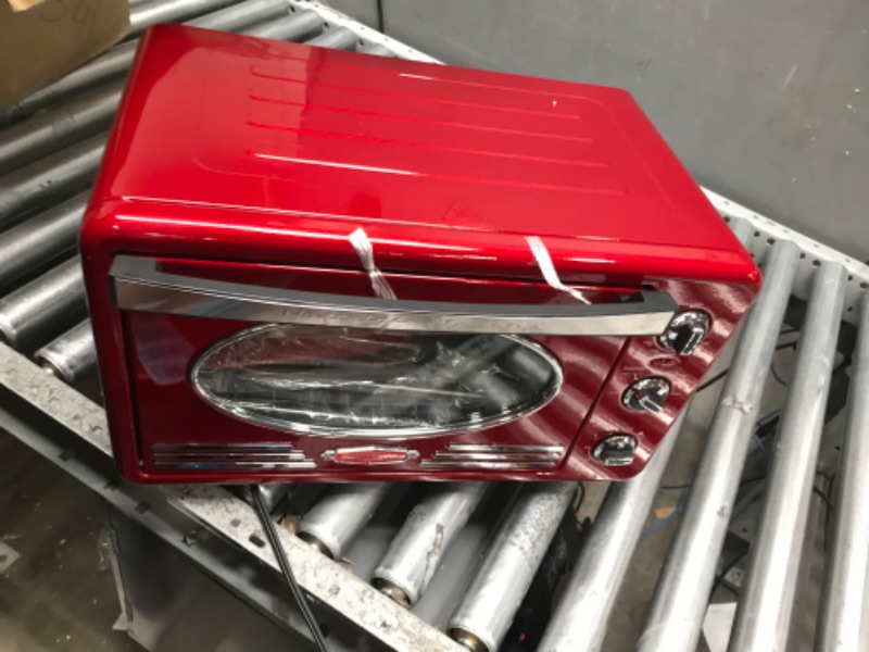 Photo 1 of Nostalgia Large-Capacity 0.7-Cu. Ft. Capacity Multi-Functioning Retro Convection Toaster Oven, Fits 12 Slices of Bread and Two 12-Inch Pizzas, Built In Timer, Includes Baking Pan, Metallic Red