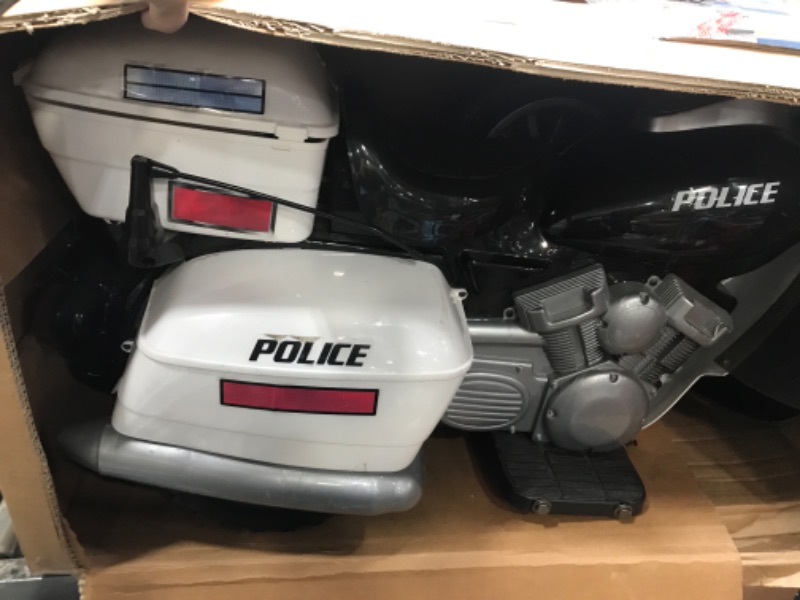 Photo 2 of ***Parts Only****Kid Motorz Police Motorcycle 12-Volt Battery-Powered Ride-On, White
