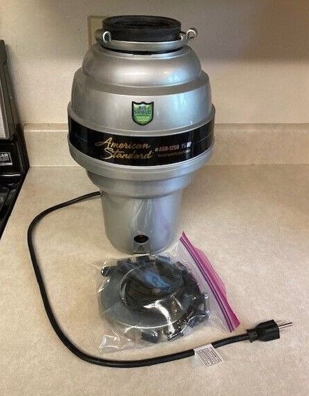 Photo 1 of American Standard 1 1/4 HP Food Waste Garbage Disposal. ASD-1250

