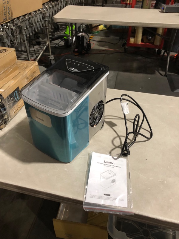 Photo 2 of ***LARGE DENT - SEE PICTURES - POWERS ON - UNABLE TO TEST FURTHER***
Silonn Ice Makers Countertop, 9 Cubes Ready in 6 Mins, Stainless Steel