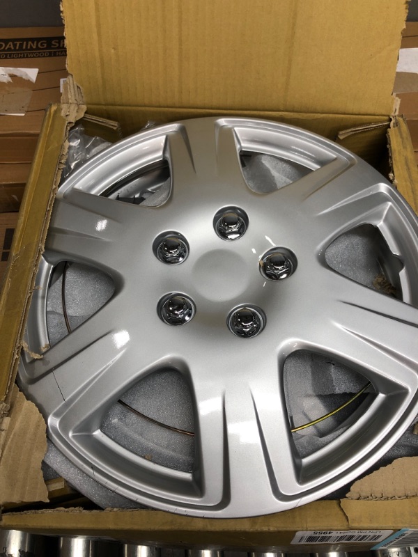 Photo 2 of Four ABS Plastic Silver Colored Hubcaps - 15 Inch Diameter