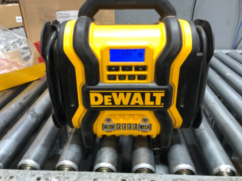 Photo 2 of DEWALT DXAEPS14 1600 Peak Battery Amp 12V Automotive Jump Starter/Power Station with 500 Watt AC Power Inverter, 120 PSI Digital Compressor, and USB Power , Yellow