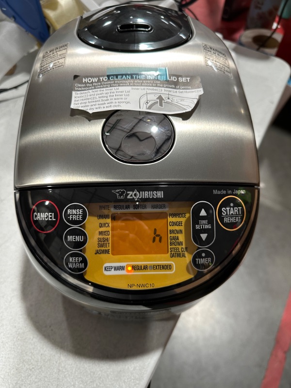 Photo 8 of * used * minor damage * see all images * 
Zojirushi NP-NWC10XB Pressure Induction Heating Rice Cooker & Warmer, 5.5 Cup