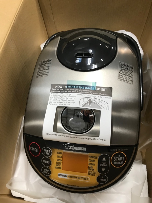 Photo 2 of * used * minor damage * see all images * 
Zojirushi NP-NWC10XB Pressure Induction Heating Rice Cooker & Warmer, 5.5 Cup