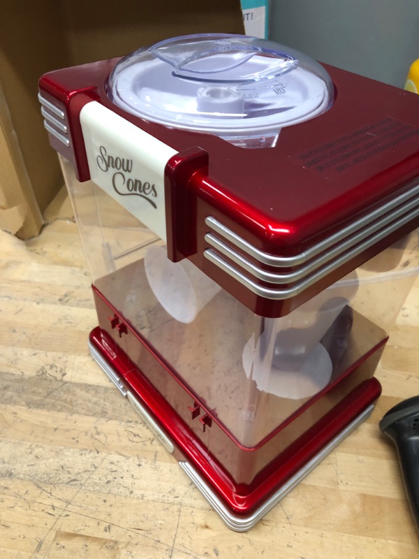 Photo 2 of **MISSING TRAY THAT HOLDS CONES  **turn lid to activate**
Nostalgia Retro Table-Top Snow Cone Maker, Makes 20 Icy Treats, Shaved Ice Machine Includes 2 Reusable Plastic Cups & Ice Scoop, Retro Red