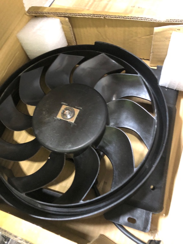 Photo 1 of Omix | 17102.52 | Engine Cooling Fan Assembly | OE Reference: 52028337AC | Fits 1997-2001 Jeep Cherokee XJ
