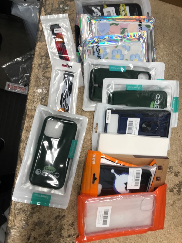 Photo 1 of 13 Piece Assorted Phone case/accessories bundle