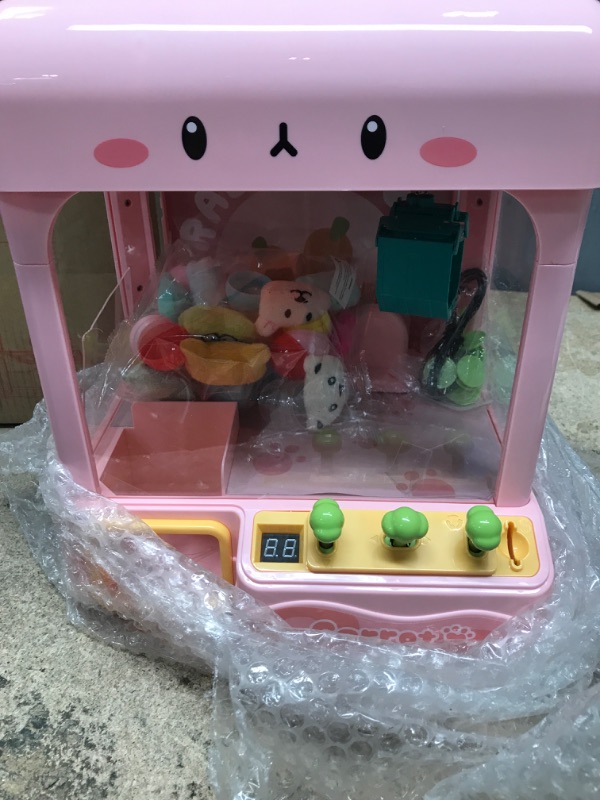 Photo 3 of 
cxjoigxi Mini Claw Machine for Kids Adults with Prizes,Volume Control and 60 Seconds Countdown,2 Power Supply Modes,Candy Gumball Vending Machines Toys for...
