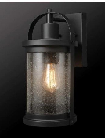 Photo 1 of **GLASS SHADE IS BROKEN***
Xavier Matte Black Farmhouse Indoor/Outdoor 1-Light Wall Sconce with Seeded Glass Shade
