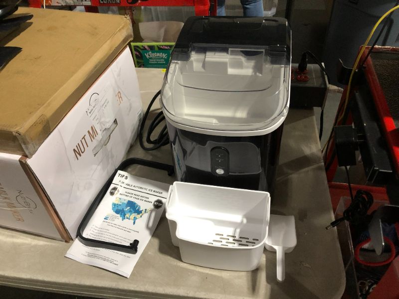 Photo 2 of ***POWERS ON - LARGE DENT ON SIDE - SEE PICTURES***
Nugget Ice Maker Countertop with Chewable Ice, 35lbs/Day, Black