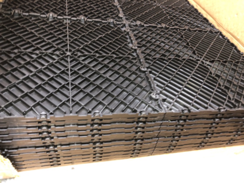 Photo 1 of GarageDeck Coin Pattern, Durable Copolymer Interlocking Modular Non-Slip Garage Flooring Tile (48 Pack), Black 48 Pack Black