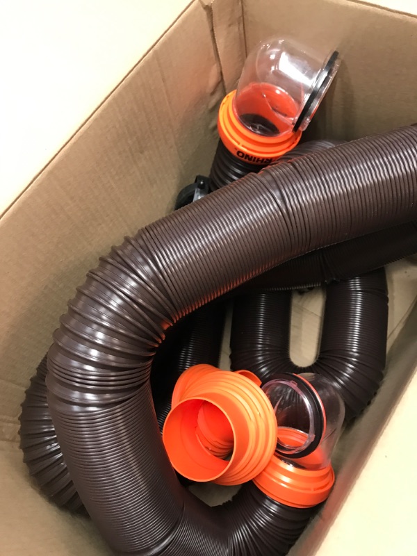 Photo 2 of Camco RhinoFLEX RV Sewer Hose Kit with Swivel Transparent Elbow and 4-in-1 Dump Station Fitting, Brown, 15 Feet (39770) 15ft Sewer Hose Kit Frustration-Free Packaging