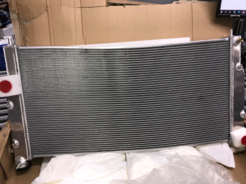 Photo 2 of *DENTED AT THE TOP**OzCoolingParts 94-02 Dodge Ram-Series Radiator, 4 Row Core Aluminum Radiator for 1994-2002 1995 1996 97 98 99 01 Dodge Ram 2500/3500 5.9L V8 Turbo Diesel Cummins