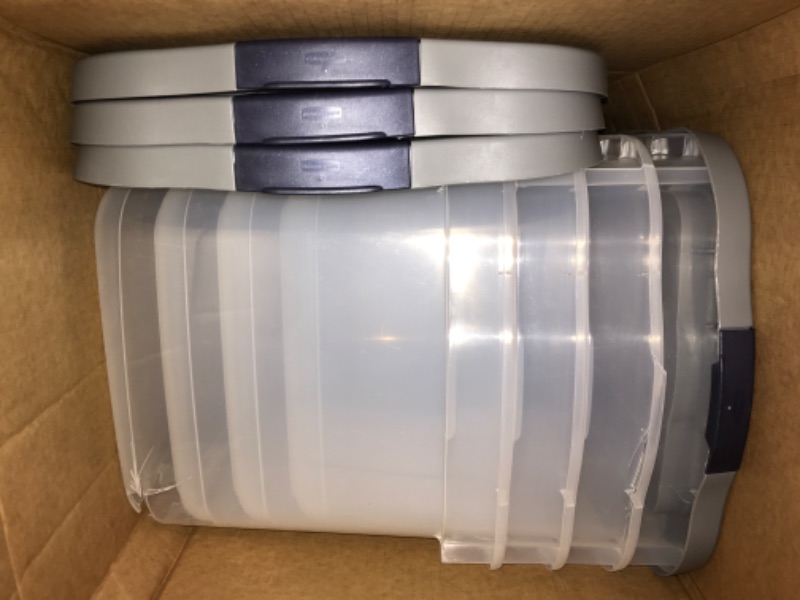 Photo 1 of 4 large plastic containers 
2-4 containers cracked 