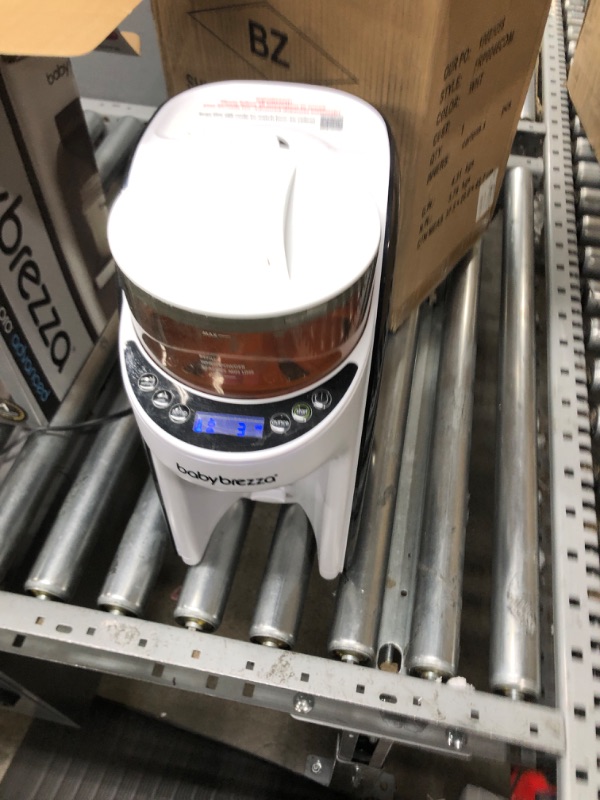 Photo 2 of New and Improved Baby Brezza Formula Pro Advanced Formula Dispenser Machine - Automatically Mix a Warm Formula Bottle Instantly - Easily Make Bottle with Automatic Powder Blending