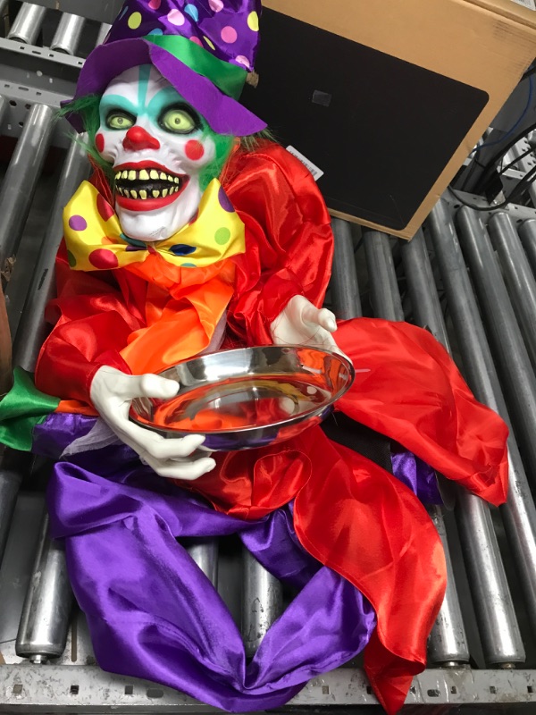 Photo 2 of Haunted Hill Farm Life-Size Animatronic Scary Clown Holding Tray with Touch Activated Lights and Sounds, Battery Operated Indoor or Covered Outdoor Halloween Decoration 60" Snimation Clown