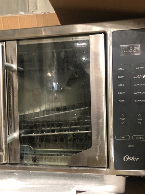 Photo 2 of * item very used * damaged * sold for parts only * 
Oster Air Fryer Oven, 10-in-1 Countertop Toaster Oven, XL Fits 2 16" Pizzas