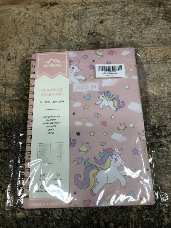 Photo 1 of Planner 2023-2024, Academic Year Planner from Jul.2023 - Jun.2024, AIMPEAK 2023-2024 Planner Weekly and Monthly with Tabs, Inner Pocket, Pen Loop, Waterproof Cover, Spiral Binding Uni-corn(7"x10") Uni-corn New-B5