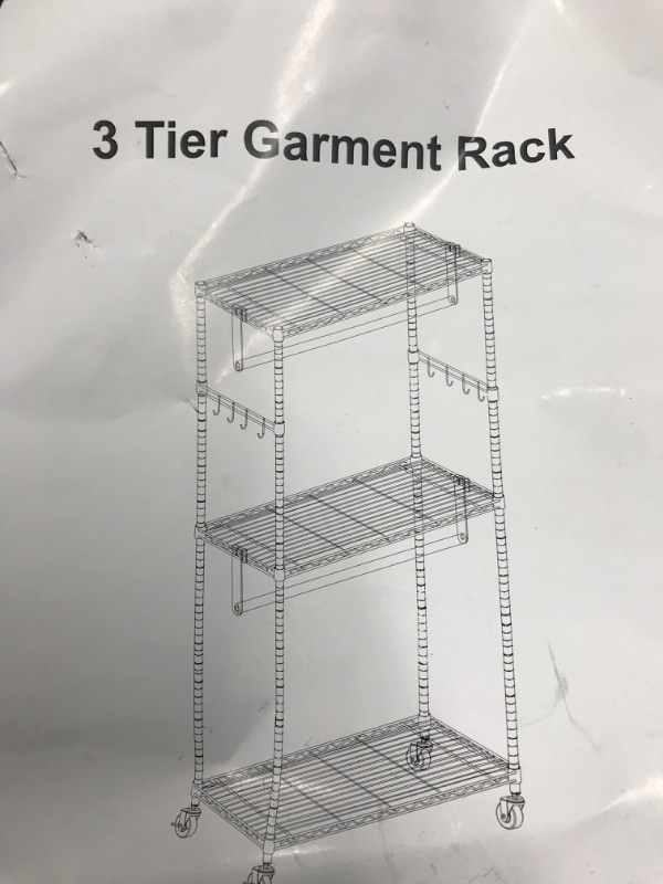 Photo 2 of 3 tier garment rack