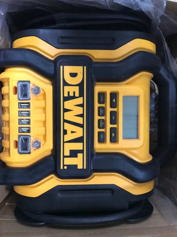 Photo 2 of **NONREFUNDABLE**FOR PARTS OR REPAIR**SEE NOTES**
DEWALT DXAEPS14 1600 Peak Battery Amp 12V Automotive Jump Starter/Power Station with 500 Watt AC Power Inverter, 120 PSI Digital Compressor, and USB Power , Yellow