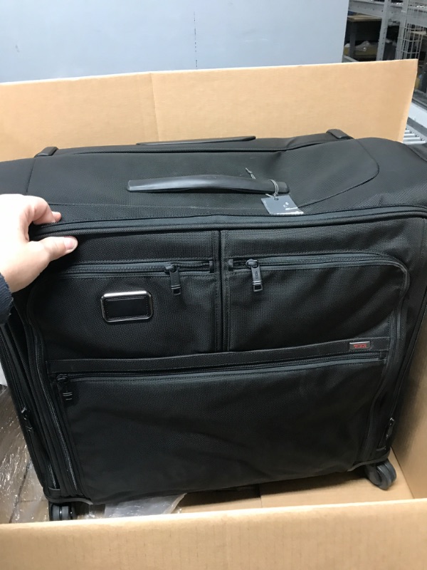 Photo 2 of (Minor Damage/See Notes) TUMI Alpha 3 Extended Trip 4-Wheeled Garment Bag with TSA Lock - Stores Suits, Coats, Dresses, and Shoes - Black