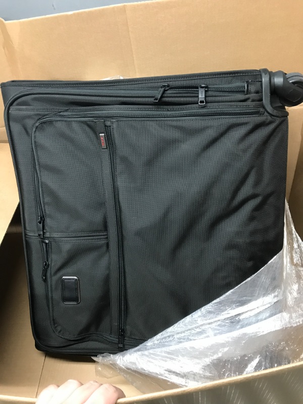 Photo 3 of (Minor Damage/See Notes) TUMI Alpha 3 Extended Trip 4-Wheeled Garment Bag with TSA Lock - Stores Suits, Coats, Dresses, and Shoes - Black