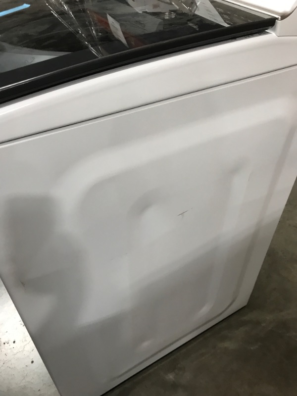 Photo 5 of Maytag - 5.3 Cu. Ft. High Efficiency Smart Top Load Washer with Extra Power Button - White
