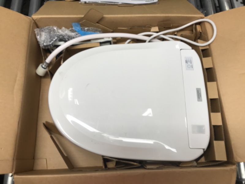 Photo 2 of * Not Functional * TOTO SW583#01 S350E Electronic Bidet Toilet Seat with Cleansing Warm, Nightlight, Auto Open and Close Lid, Instantaneous Water Heating, and EWATER+, Round, Cotton White
