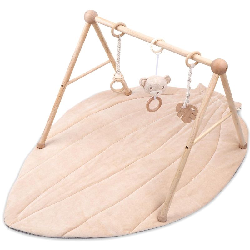 Photo 1 of COTTONBEBE Organic Baby Gym Wooden Cotton Play Mat, Super Soft Infant Activity Center for Tummy Time, Wood Baby Hanging Sensory Toys for Babies Girl Boy 0-36 Months, Newborn Gifts, Brown Leaf
