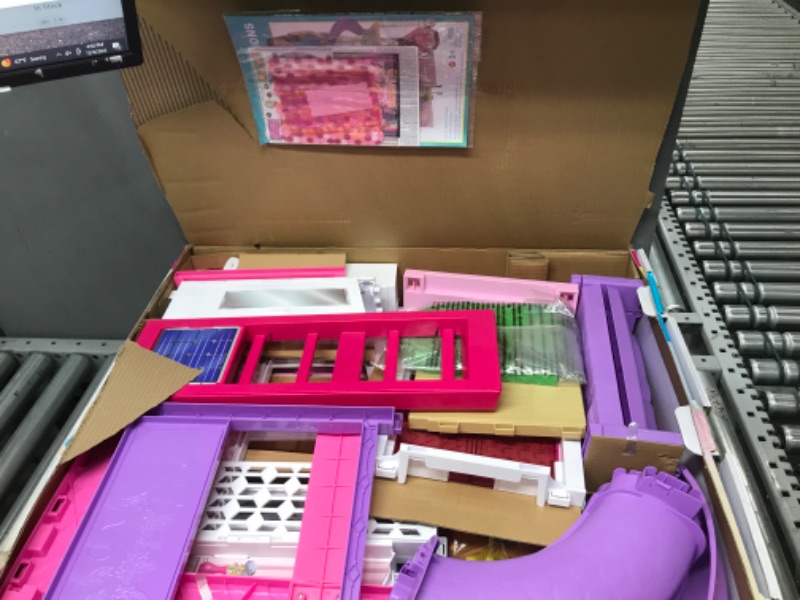Photo 1 of Barbie Dreamhouse, Doll House Playset with 70+ Accessories Including Transforming Furniture, Elevator, Slide, Lights & Sounds Wheelchair Accessible Elevator