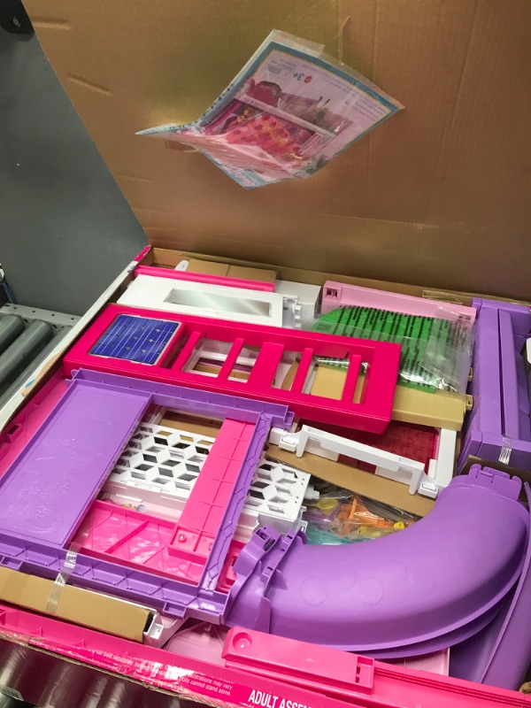 Photo 1 of Barbie Dreamhouse, Doll House Playset with 70+ Accessories Including Transforming Furniture, Elevator, Slide, Lights & Sounds Wheelchair Accessible Elevator