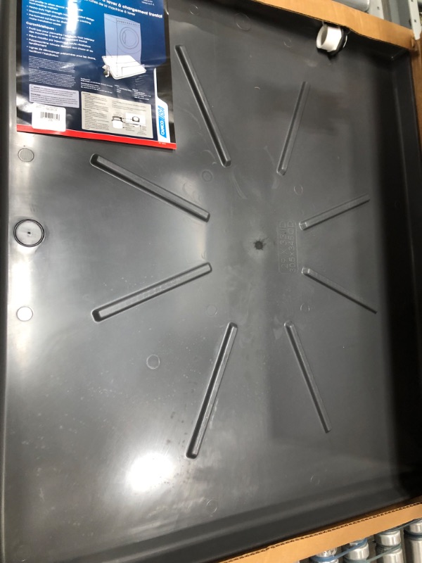 Photo 1 of Camco 20784 Low Profile Washing Machine Drain Pan with PVC Fitting, 30 ½-Inch x 34 ½-Inch, Graphite - Protects Your Floors from Washing Machine Leaks - Easy to Use Standard Packaging Graphite 30.5" x 34.5"